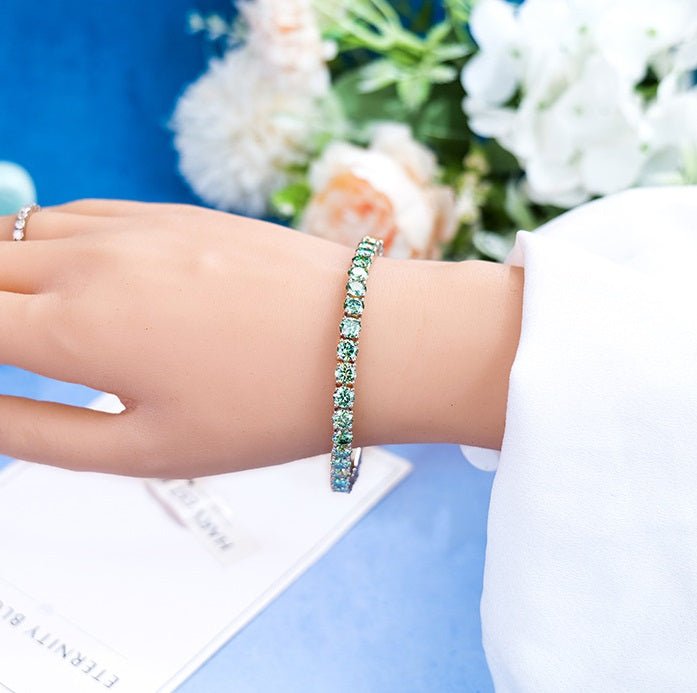 1 55 VANNICK Teal-Blue Moissanite Tennis Bracelet in 925 Sterling Silver - VANNICK