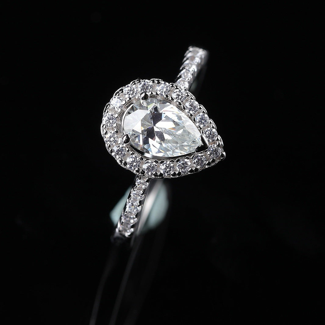 #64 VNK Luxury Pear Cut Halo Moissanite Ring in 925 Sterling Silver