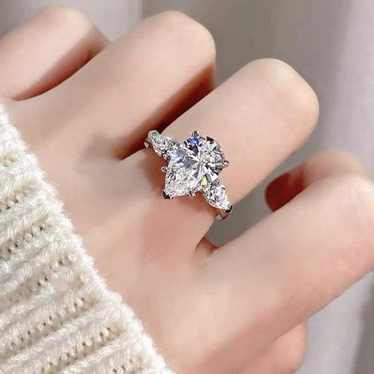#124 VNK Luxury 4 Carat Pear Moissanite Three-Stone Ring | Timeless Side Accent Design