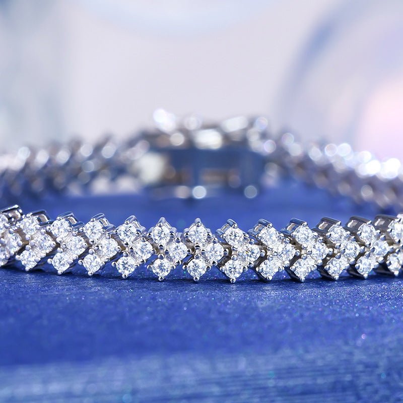 154 VANNICK Cross-over Moissanite Tennis Bracelet in 925 Sterling Silver - VANNICK