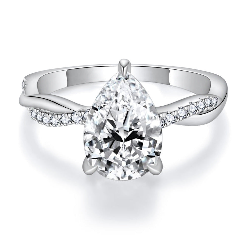 #125 VNK Luxury 2CT Pear Moissanite Ring | Twisted Band with 0.23CT Luminous Accents