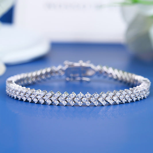 #154 VANNICK Cross-over Moissanite Tennis Bracelet in 925 Sterling Silver