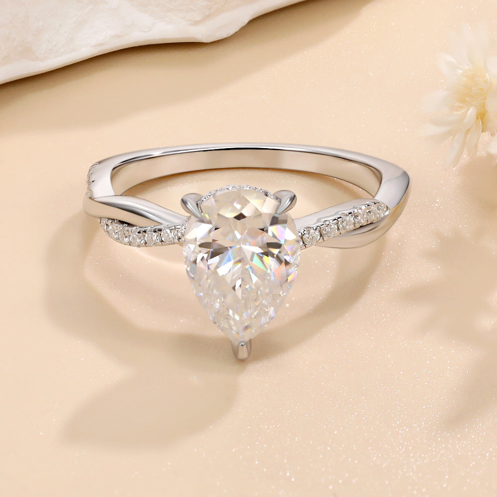 #125 VNK Luxury 2CT Pear Moissanite Ring | Twisted Band with 0.23CT Luminous Accents