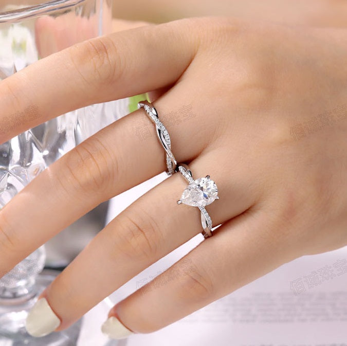 #125 VNK Luxury 2CT Pear Moissanite Ring | Twisted Band with 0.23CT Luminous Accents